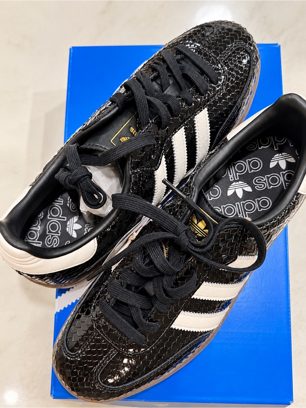 adidas Women's Black Patent Snakeskin Sneakers with White Stripes